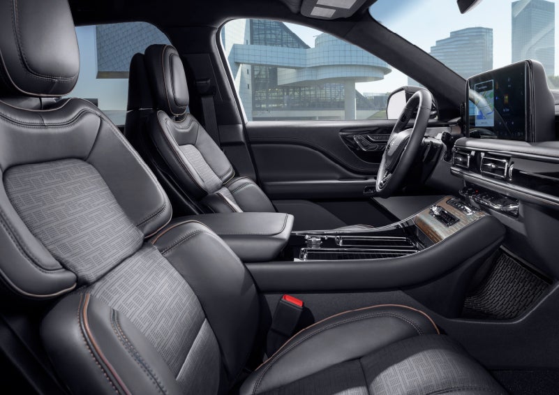 The interior of the 2025 Lincoln Aviator® SUV is shown with sleek black accents. | Capital Lincoln of Wilmington in Wilmington NC