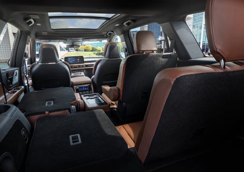 The interior of the 2025 Lincoln Aviator® SUV is shown with two seats folded down for added space. | Capital Lincoln of Wilmington in Wilmington NC