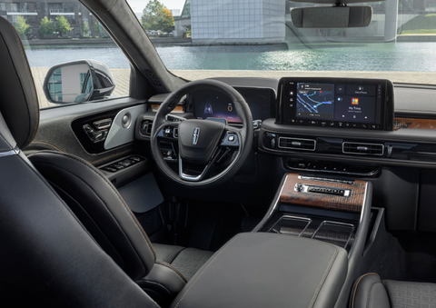 The interior of the 2025 Lincoln Aviator® SUV is shown parked with a view of a harbor through the windshield. | Capital Lincoln of Wilmington in Wilmington NC