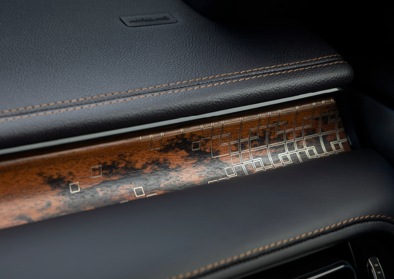 A close-up shot of the 2025 Lincoln Aviator® dashboard with unique black and brown accents, and brown stitching. | Capital Lincoln of Wilmington in Wilmington NC