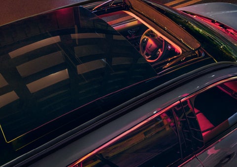 The panoramic Vista Roof®, standard on Grand Touring models, is shown from above.