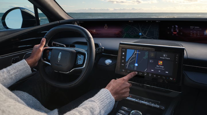 The driver of a 2025 Lincoln Nautilus® SUV interacts with the new Lincoln Digital Experience. | Capital Lincoln of Wilmington in Wilmington NC