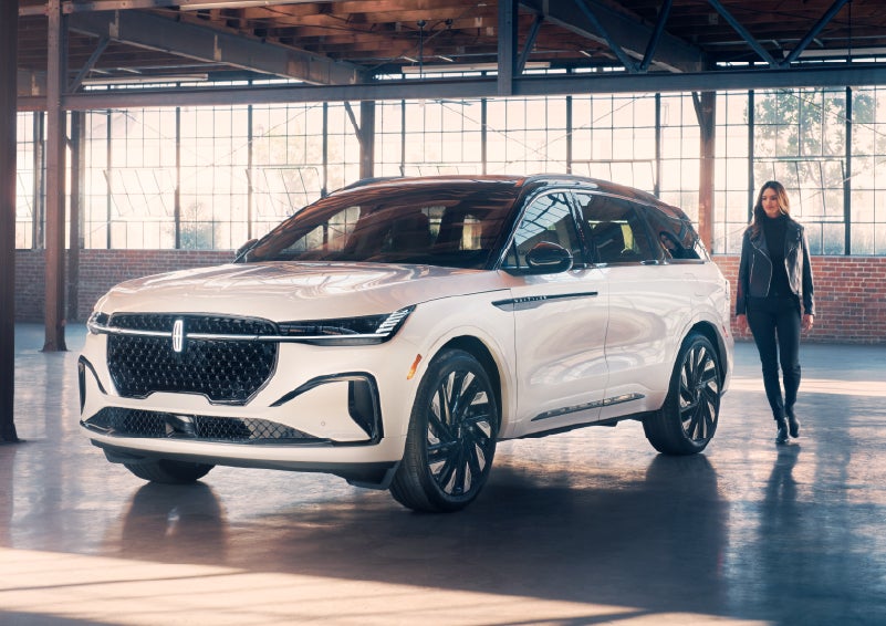 A person approaches a 2025 Lincoln Nautilus® SUV. | Capital Lincoln of Wilmington in Wilmington NC
