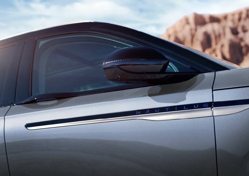 Blue lettering on the side of the vehicle that reads nautilus indicates the available hybrid powertrain. | Capital Lincoln of Wilmington in Wilmington NC