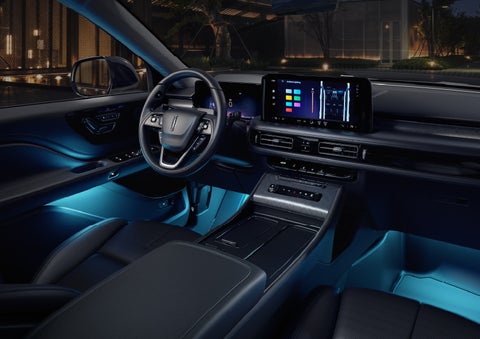 Deep blue Ambient Lighting glows from various places within a 2026 Lincoln Aviator® SUV. | Capital Lincoln of Wilmington in Wilmington NC