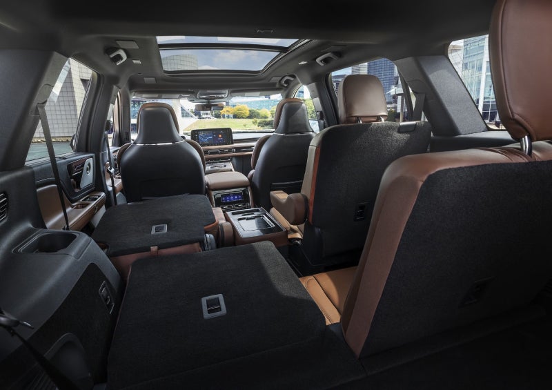 One side of the PowerFold® third-row seat and a second-row seat are folded forward in the 2026 Lincoln Aviator® SUV. | Capital Lincoln of Wilmington in Wilmington NC