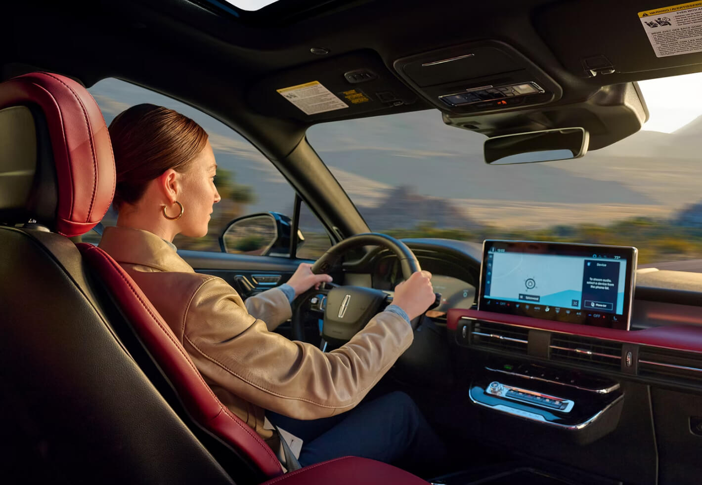 Woman Driving Lincoln Interior View