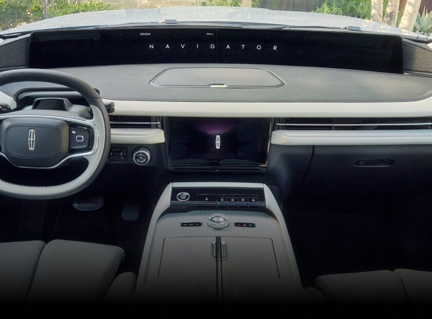 View of a 2026 Lincoln Navigator Reserve dashboard featuring a massive panoramic screen.