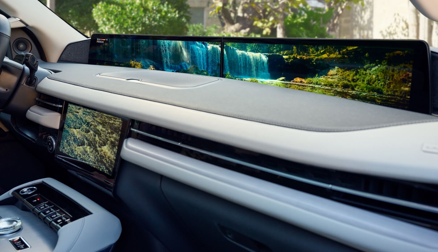 Angled passenger-side view of a 2026 Lincoln Navigator Reserve dash showcasing a panoramic display.